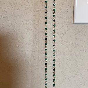 Long green beaded necklace